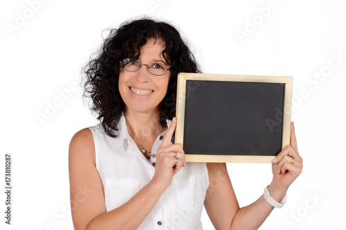 School teacher holding chalkboard.