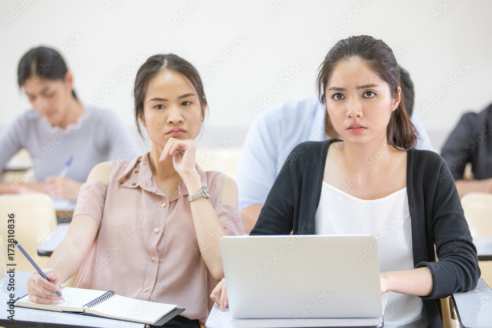 Asian People study together in classroom. People with Education concept. Asian People study together in classroom. People with Education concept.