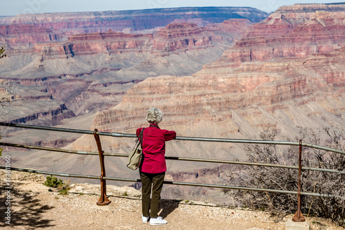 Woman in Red Coat at the Railing on a Vista Point, Grand Canyon, Arizona
