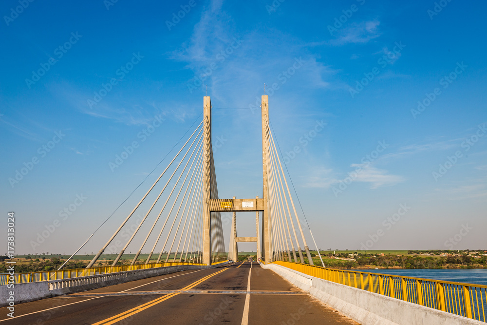Obraz premium Cable-stayed bridge over Parana river, Brazil. Border of Sao Paulo and Mato Grosso do Sul states