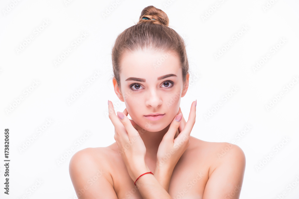Young beauty girl with healthy care beautiful healthy clean skin and hand touching face isolated Young beauty girl with healthy care beautiful healthy clean skin and hand touching face isolated