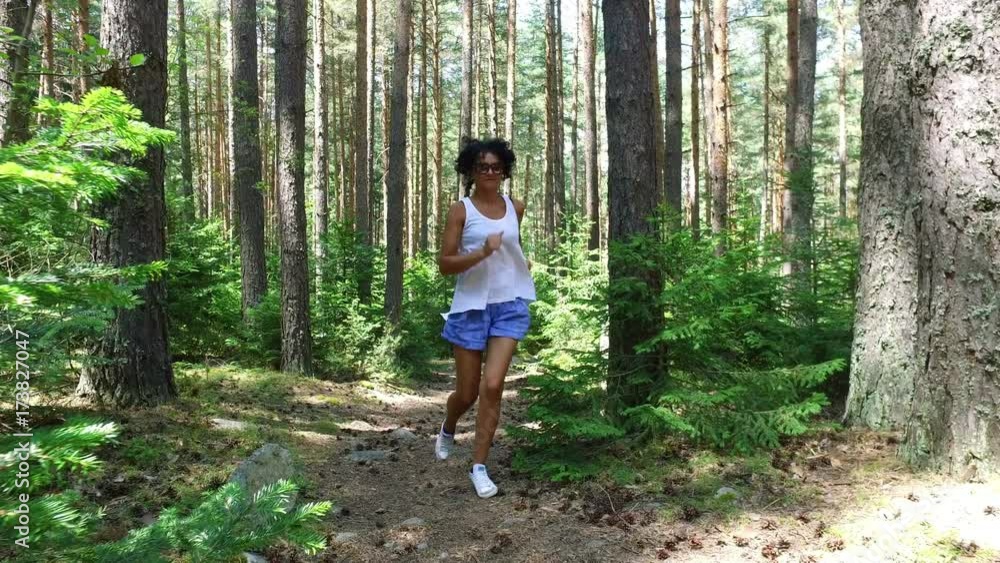 young fashion model woman trail runner running in forest, young fashion model woman trail runner running in forest,