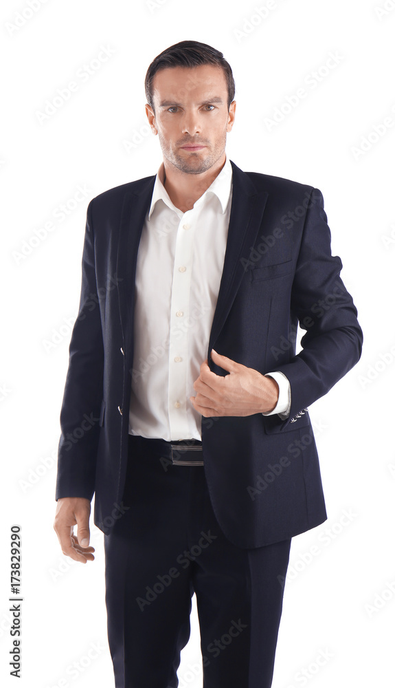 Handsome man in elegant black suit on white background Handsome man in elegant black suit on white background