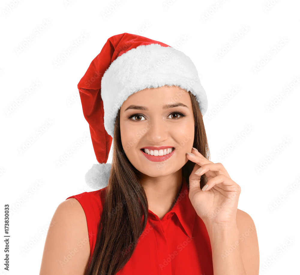 Beautiful young woman in Santa Claus hat on white background Beautiful young woman in Santa Claus hat on white background