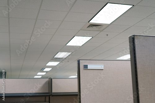 office cubicle and room ceiling with lamp