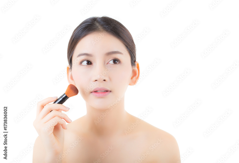 Beauty asian woman applying make up with brush isolated on white background, health clean skin cosmetics concept. Beauty asian woman applying make up with brush isolated on white background, health clean skin cosmetics concept.