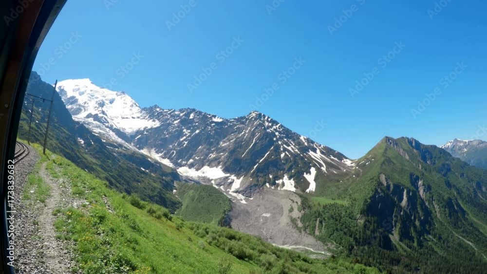 Winter Alps mountains, POV view to Mont Blanc from train Winter Alps mountains, POV view to Mont Blanc from train