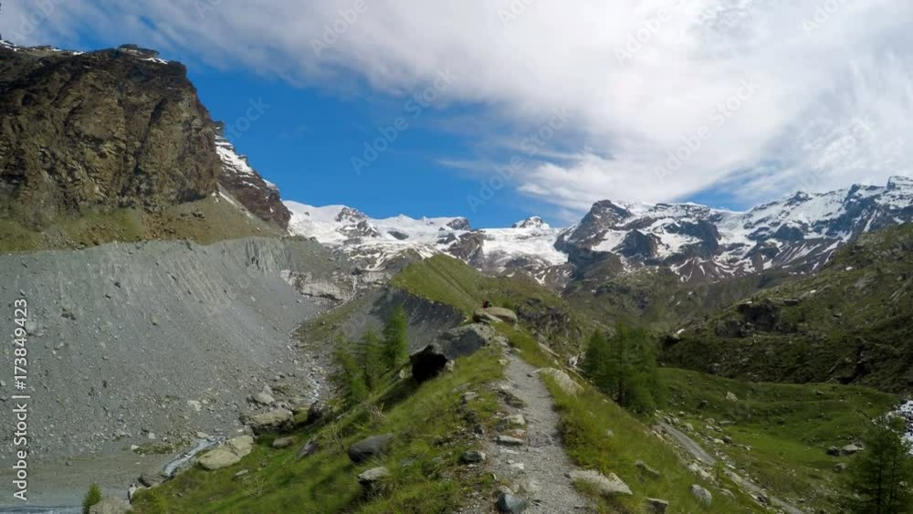 Hiker POV. Hiking in the mountains on a tourist track Hiker POV. Hiking in the mountains on a tourist track