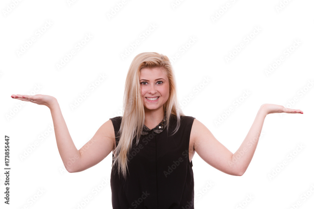 Blonde woman pointing with hands at copyspace Blonde woman pointing with hands at copyspace