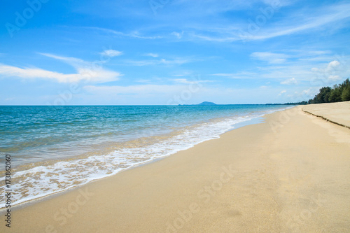 Beautiful beach and tropical sea with cloudy and blue sky