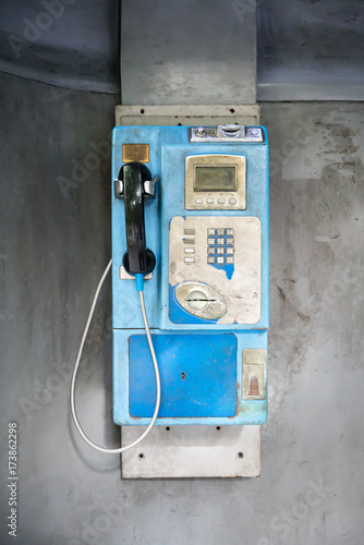 Blue vintage public pay phone