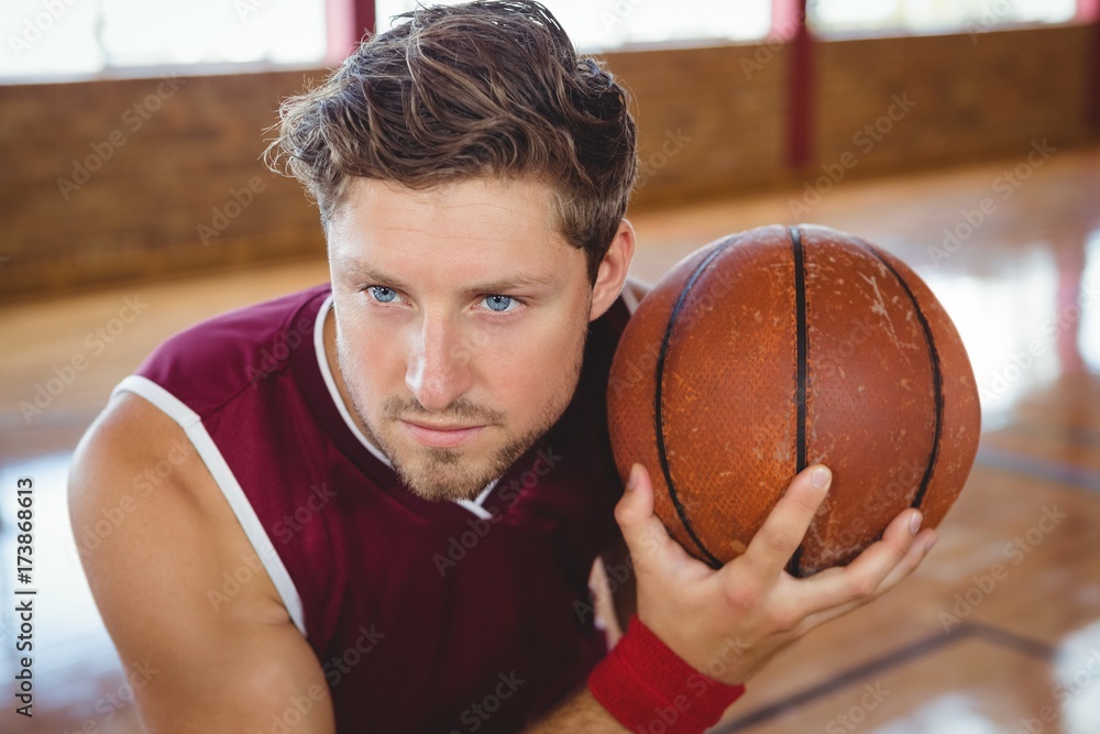Close up of basketball player holding ball Close up of basketball player holding ball