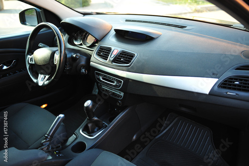 interior of a modern car. Black dashboard 