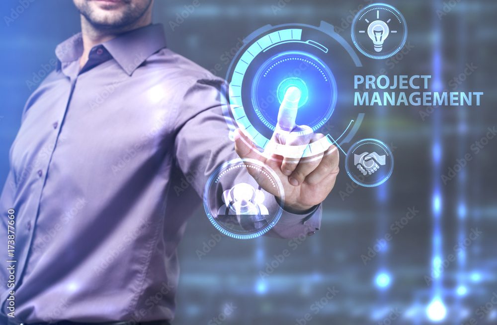 The concept of business, technology, the Internet and the network. A young entrepreneur working on a virtual screen of the future and sees the inscription: Project management