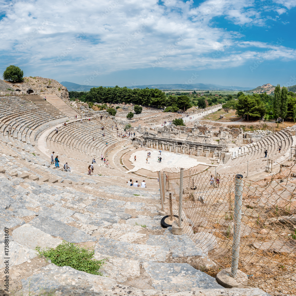 People visit Amphitheatre (Coliseum) at Ephesus historical ancient city, in Selcuk.High Resolution panoramic view.Izmir,Turkey:20 August 2017