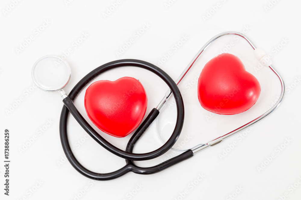Red heart and a stethoscope. Isolated on white background. Studio lighting. Concept for healthy and medical