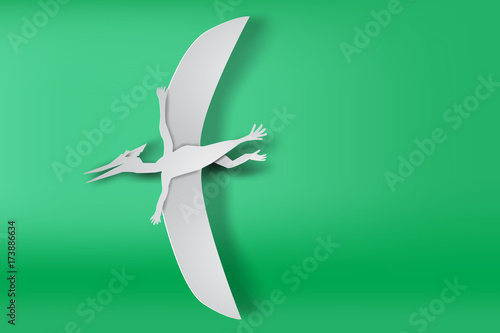 paper art of Pteranodon dinosour on green background vector