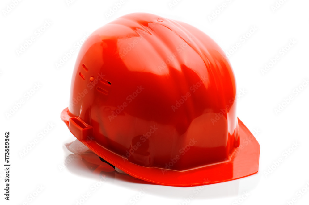 Fototapeta premium Red helmet isolated on a over white background