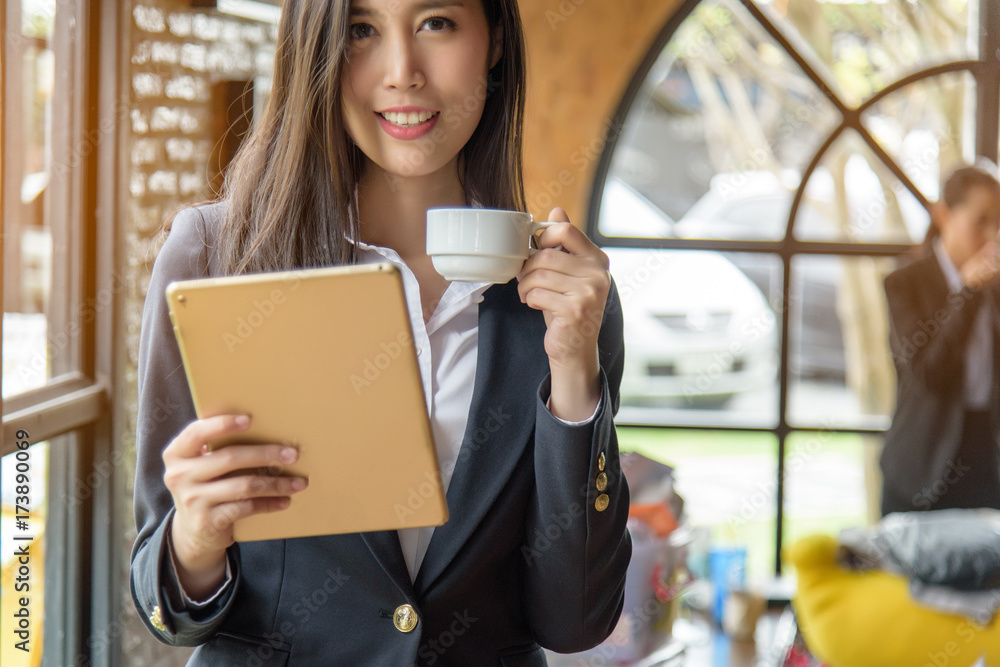 Fototapeta premium Happy young businesswoman after checking email during coffee break. Target Success. Reach the goal. Business concept.