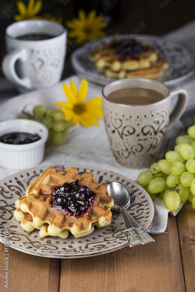 Breakfast with Belgian waffles Breakfast with Belgian waffles