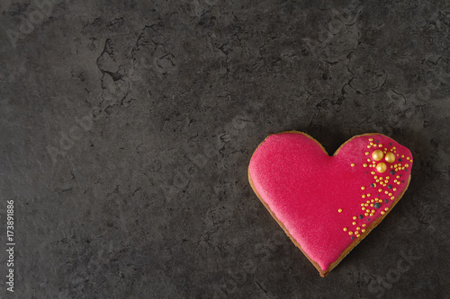 Heart cookie. St. Valentine's Day, Wedding. Dark background.
