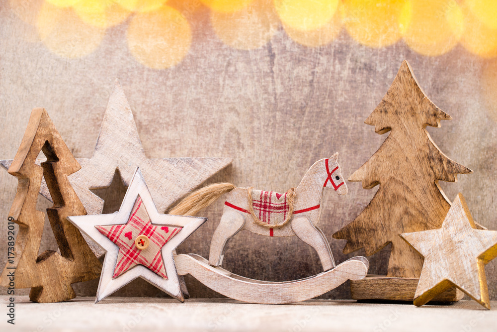 Christmas tree decorations on a wooden background. With bokeh ornaments. Christmas tree decorations on a wooden background. With bokeh ornaments.