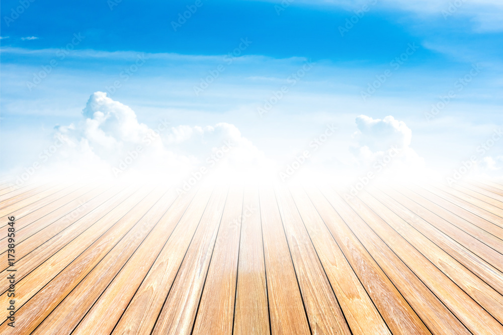 Wood tabletop with clouds sky during morning background.