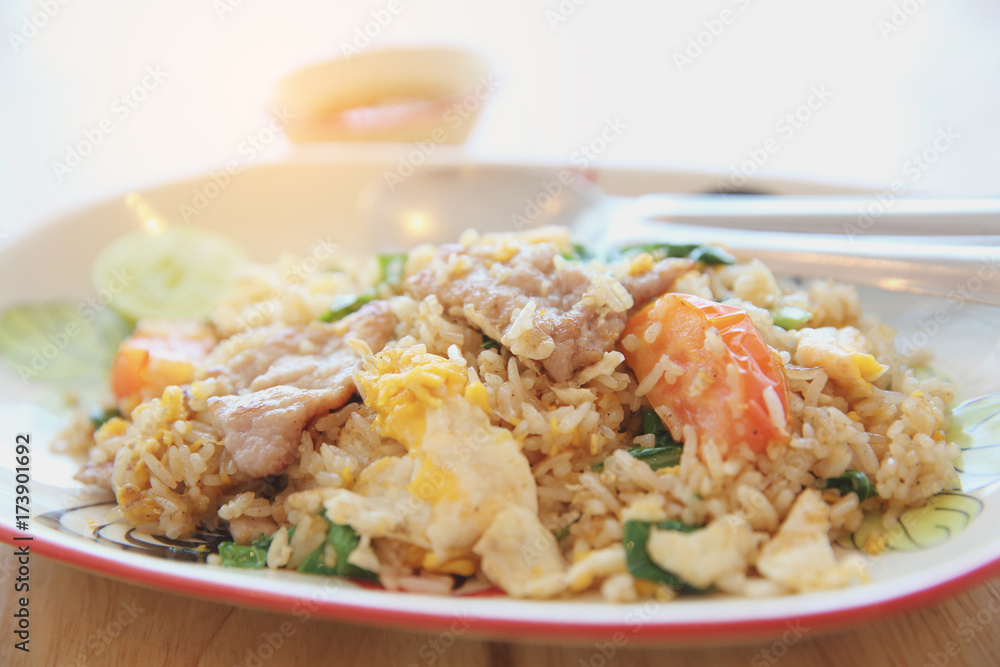 Pork fried rice with lime on wood background , Thai food Pork fried rice with lime on wood background , Thai food