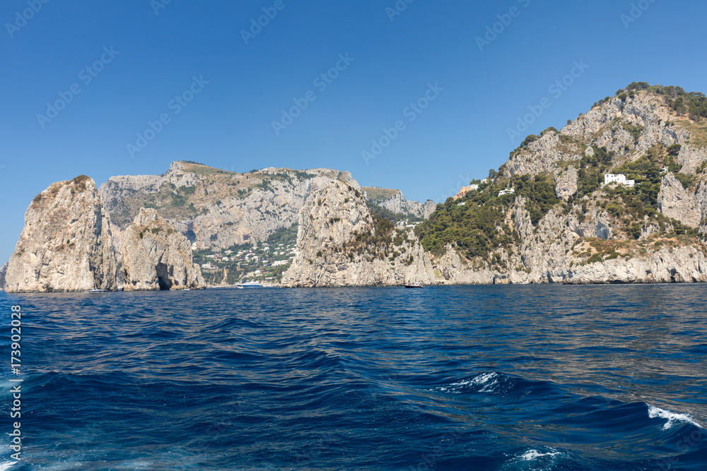 View from the boat on the cliff coast of Capri Island. Italy