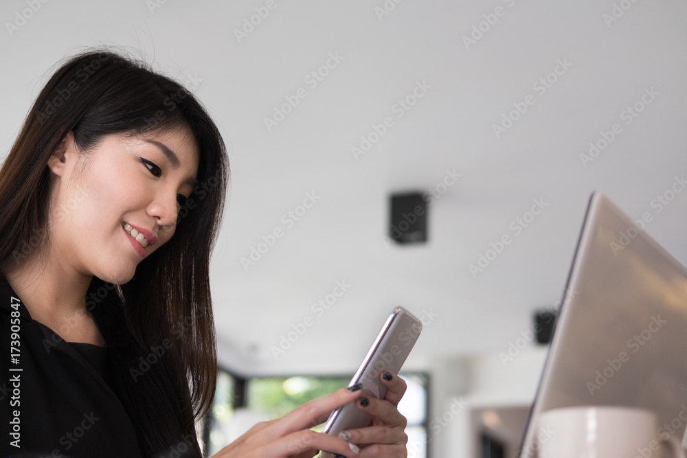 businesswoman use mobile phone at workplace. young woman texting message on smart phone at office. freelancer use cellphone for online network connection at cafe coffee shop. businesswoman use mobile phone at workplace. young woman texting message on smart phone at office. freelancer use cellphone for online network connection at cafe coffee shop.