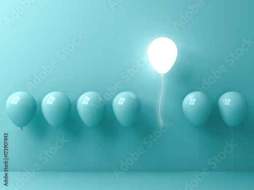 Obraz na płótnie Stand out from the crowd and different concept , One light balloon flying away from other green balloons on light green pastel color wall background with window reflections and shadows