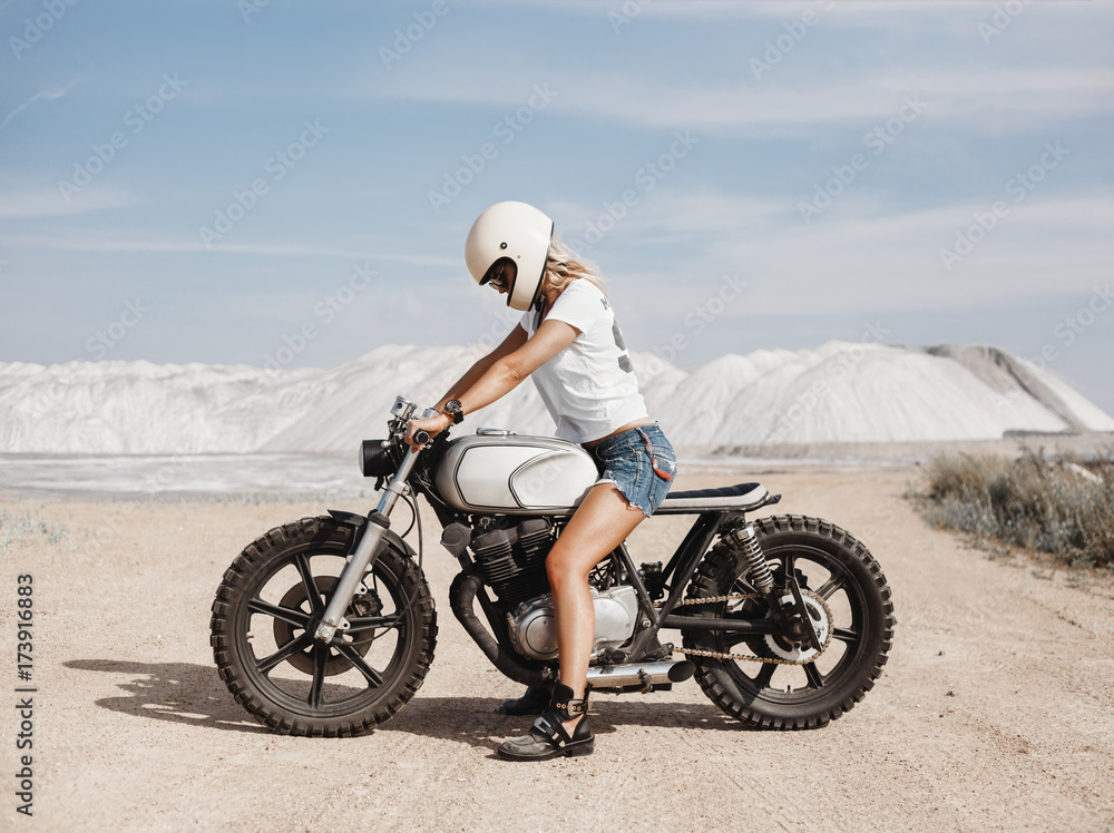 Female on custom built cafe racer motorcycle Stock Photo Adobe Stock