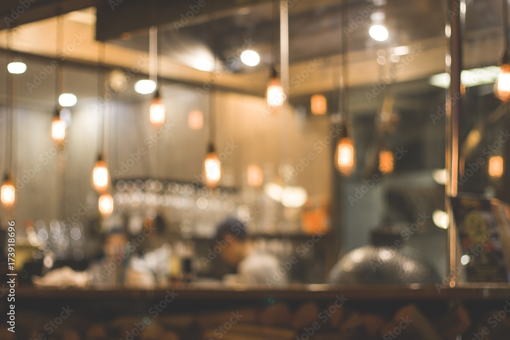 Abstract blurred bokeh (defocused) restaurant, cafe, bar, pub, nightclub, coffee shop or pizzeria background. Basic background for design. - obrazy, fototapety, plakaty 