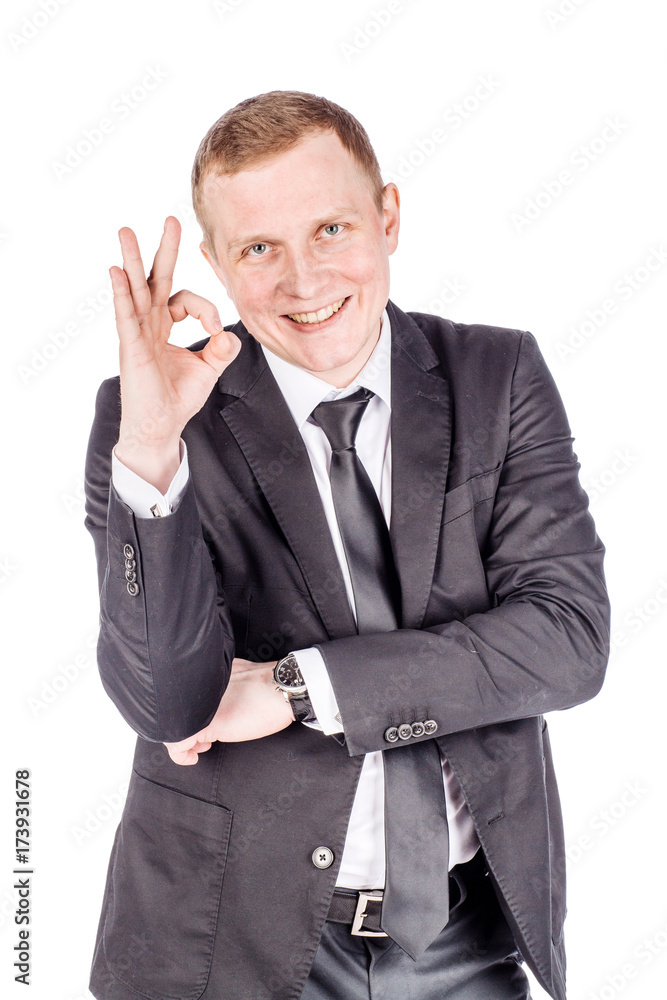 businessman showing OK while standing against white background businessman showing OK while standing against white background