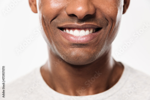 Cropped photo of young cheerful african man