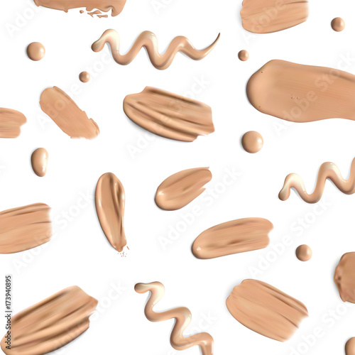 Liquid foundation smears on white background
