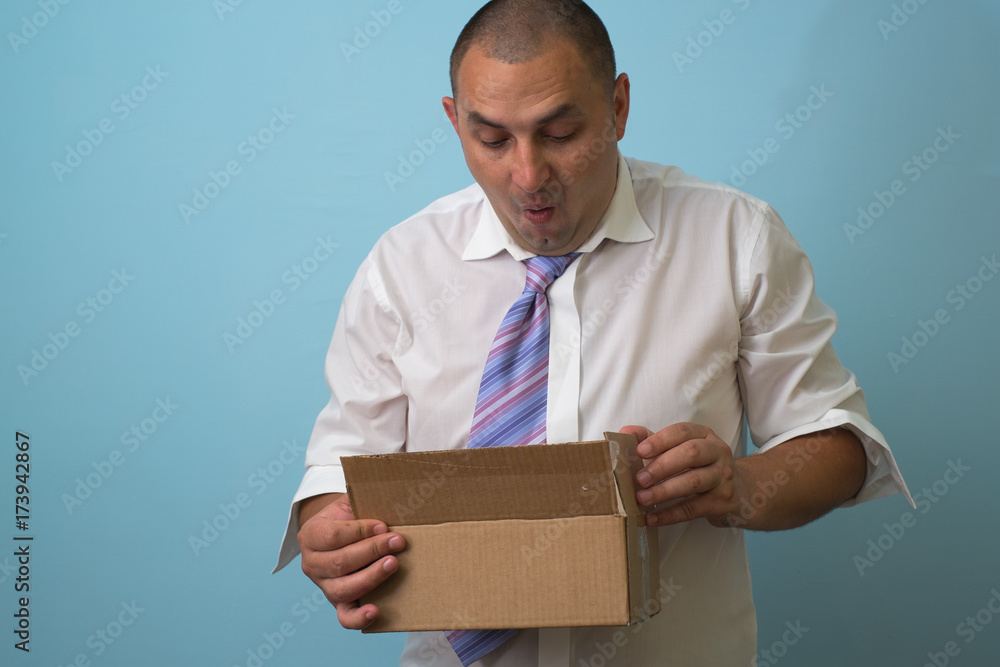 Businessman with a box Businessman with a box