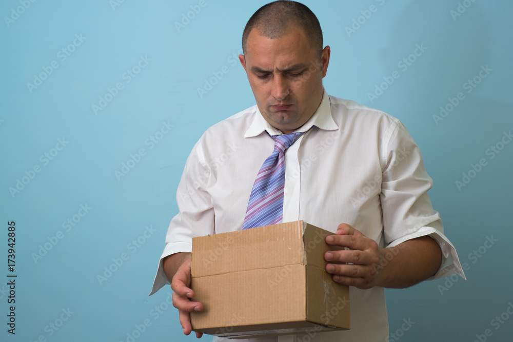 Businessman with a box Businessman with a box
