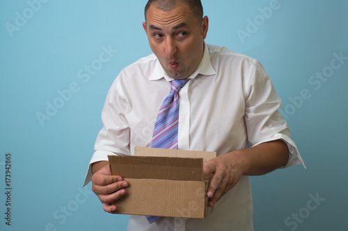 Fotografie Businessman with a box