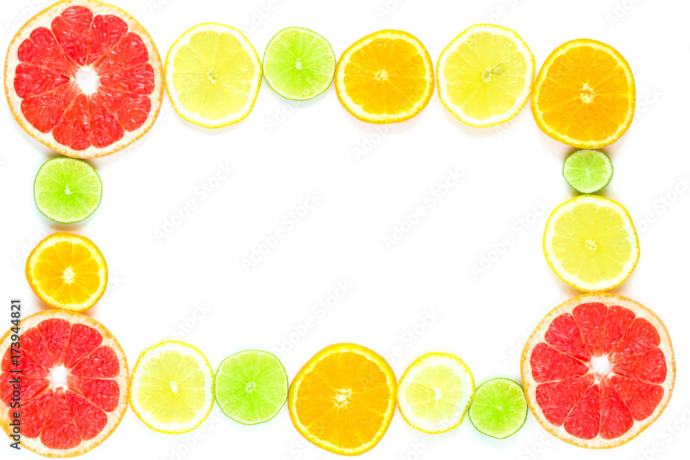 frame with slice of oranges, lemons, limes, grapefruit pattern isolated on white background. Flat lay frame with slice of oranges, lemons, limes, grapefruit pattern isolated on white background. Flat lay
