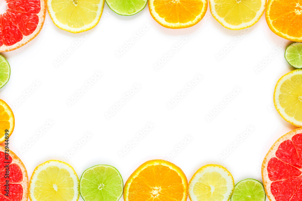 frame with slice of oranges, lemons, limes, grapefruit pattern isolated on white background. Flat lay