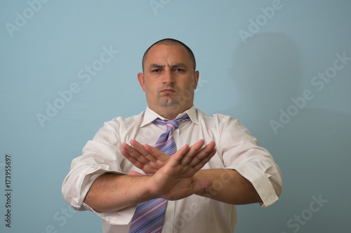 Stop gesture with indignation shown by men