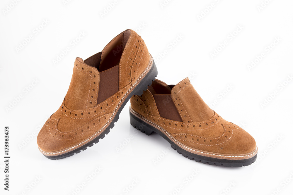 Female Brown Leather Shoe on White Background, Isolated Product. Female Brown Leather Shoe on White Background, Isolated Product.