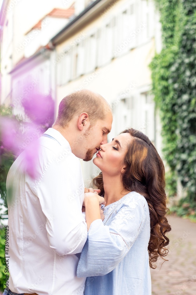 A loving couple is walking around the city. Warm autumn. Summer. Spring. Happy couple. Wedding. Love. A loving couple is walking around the city. Warm autumn. Summer. Spring. Happy couple. Wedding. Love.
