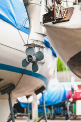 Acrylglasbilder Wasser Motorsport Motoryacht mit Propeller in Werft  © glebchik