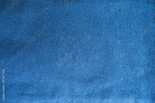Deep blue simple linen fabric from above © Anna