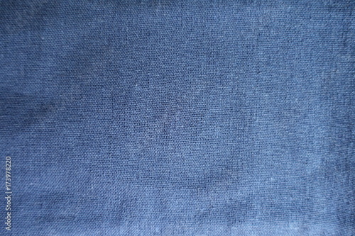 Simple blue linen fabric surface from above