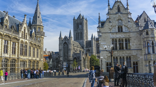 The Sint Michielsbrug bridge  the landmarks of Ghent, such as medieval mansions, St Nicholas Church and Belfort van Gent (Belfry), Belgium. photo