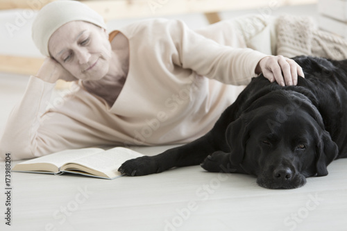 Woman with cancer reading book