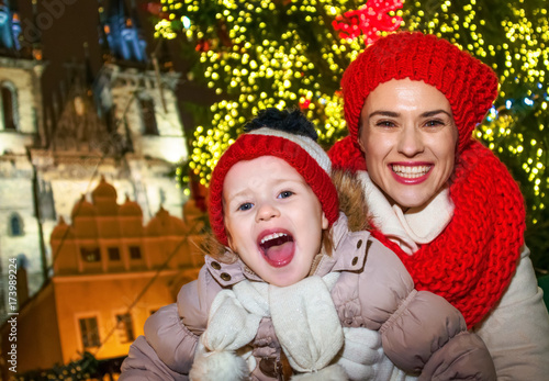mother and daughter tourists at Christmas in Prague Czechia